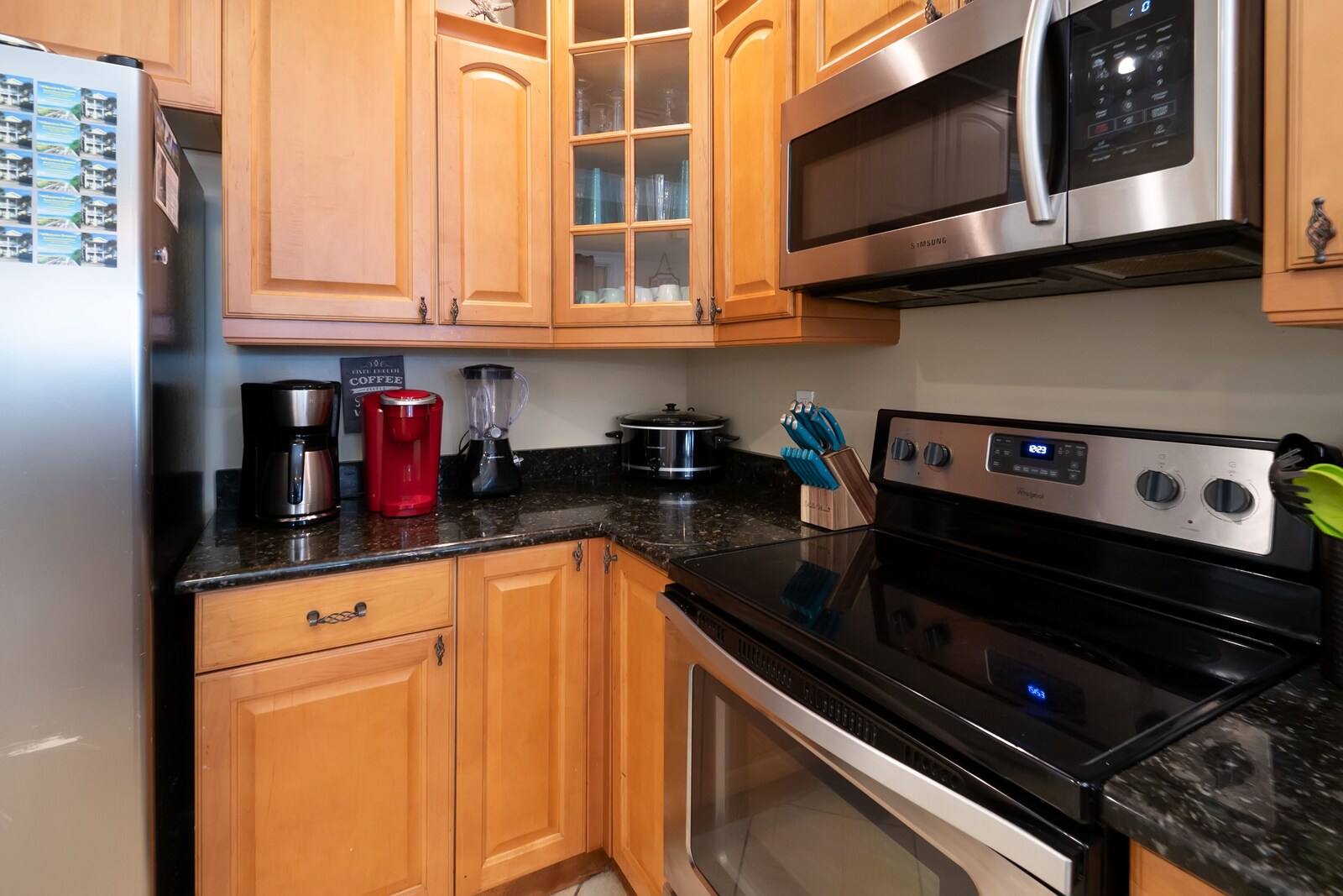 stovetop, refrigerator, indoor, oven, coffee and or coffee maker, kitchen, microwave, kitchen visible at Albacore Adventure PCB