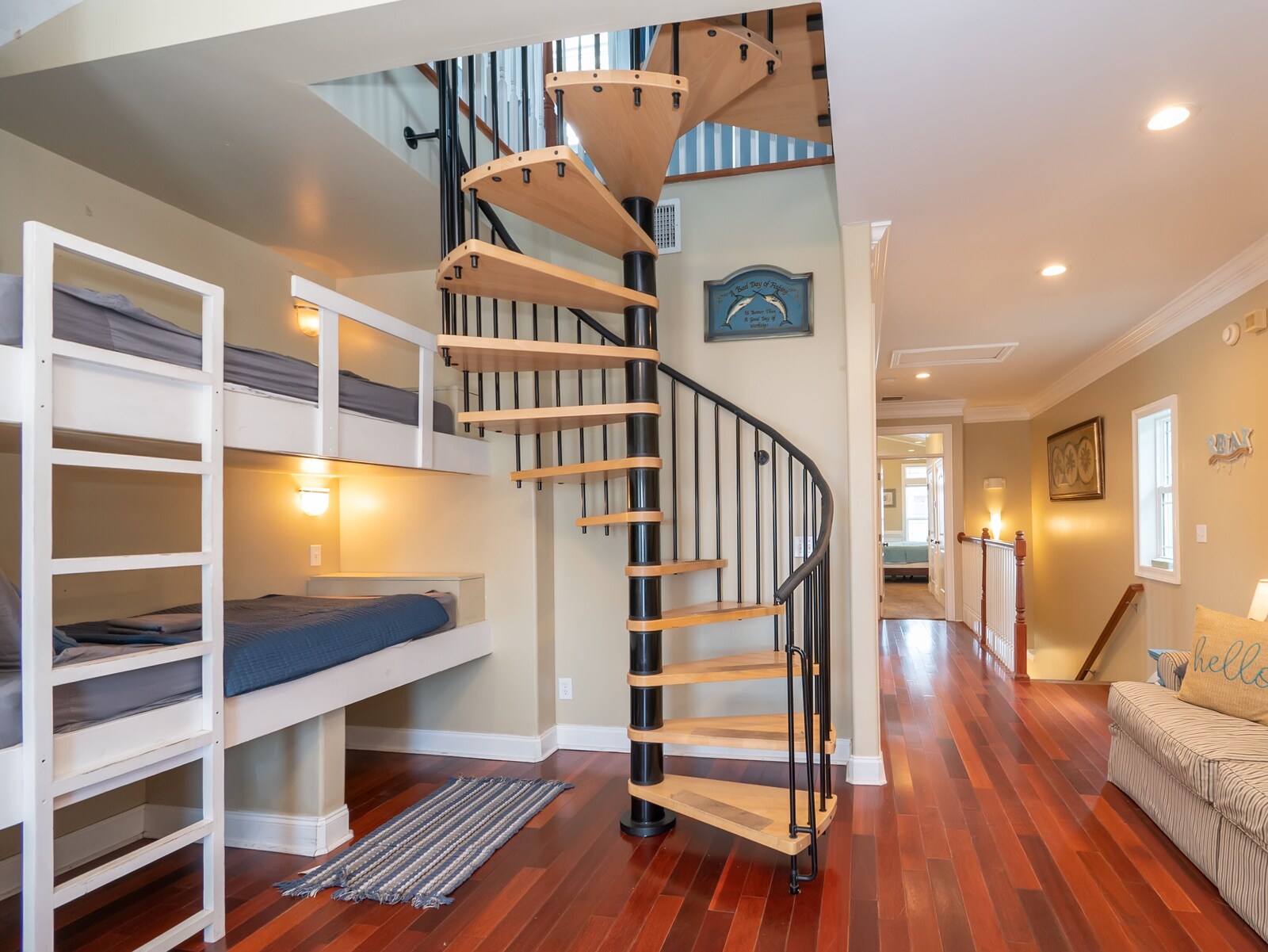 Bunk area and spiral staircase inside the home